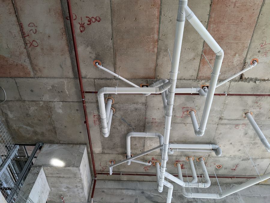 Suspended drainage pipework under slab